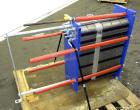Used Alfa Laval Plate Exchanger, 215 Square Feet, Model M6-MFG.  (146) 0.60 mm thick 316 stainless steel plates, approximately 9-1/2” wide x 29-1/2” tall. Designed 149 psi at 250 degrees F.  (2) 2” I...