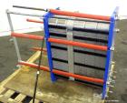 Used Alfa Laval Plate Exchanger, 215 Square Feet, Model M6-MFG.  (146) 0.60 mm thick 316 stainless steel plates, approximately 9-1/2” wide x 29-1/2” tall. Designed 149 psi at 250 degrees F.  (2) 2” I...
