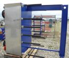 Used Alfa Laval Vicarb Plate Exchanger, 1610.3 Square Feet, Model V110-SST-200. Duty 12780 KBTU/H. (139) Approximately 36’’ wide x 60’’ tall 316 stainless steel plates. Designed 150 psi at 20 to 150 ...