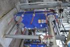 Used Alfa Laval Plate Heat Exchanger, 195.60 Square Feet, Model Widegap200S-FG. (25) 0.80mm 316 Stainless steel plates, rated 145 Full Vacuum psi at -20 to 270 degrees F. National Board# 30388, seria...