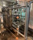Used Alfa Laval Stainless Steel Plate And Frame Heat Exchanger, approximate 1000 Sq. Ft., E-4707. Stainless steel Plates. No visible Name Plate, Sq. Ft. is approximate.