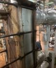 Used Alfa Laval Stainless Steel Plate And Frame Heat Exchanger, approximate 1000 Sq. Ft., E-4707. Stainless steel Plates. No visible Name Plate, Sq. Ft. is approximate.