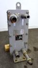 Used Bell & Gossett Plate Exchanger, 9.10 Square Feet, Model GPX-130-007. (7) 304 Stainless steel plates. Designed 115 psi at 225 degrees F. (2) 2” Inlets, (2) 2” outlets. Mounted on a carbon steel e...