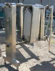 Used- Cherry Burrell Plate Heat Exchanger, Model SLAS-100. Approximately 250 square feet, 304 stainless steel. (94) 13 1/2