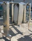 Used Cherry Burrell Plate Heat Exchanger, Model SLAS-100. Approximately 250 square feet, 304 stainless steel. (94) 13 1/2