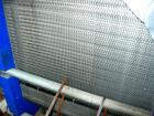 Used Paul Mueller Plate and Frame Heat Exchanger, Model AT-80B-20, 1536 square feet, 304 stainless steel. (172) Approximately 24'' wide x 70'' tall plates. Rated 150 psi at 150 deg F. 6'' inlet/outle...