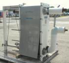 Used Mueller Plate Heat Exchanger, Approximately 831 Square Feet, Model AT40 B-20. (74) 316 Stainless steel plates. Designed for 100 psi max at 150 degrees F max. 4-1/2