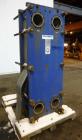 Used Mueller Accu-Therm Plate Heat Exchanger, Approximate 700 Square Feet Surface Area, Model AT80-LB-20. Approximate (82) 316 stainless steel plates rated 80psi at -20 to 300 degrees F. (4) 6-3/4