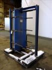 Used Mueller Accu-Therm Plate Heat Exchanger, Approximate 700 Square Feet Surface Area, Model AT80-LB-20. Approximate (82) 316 stainless steel plates rated 80psi at -20 to 300 degrees F. (4) 6-3/4