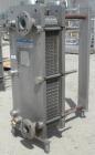 Used Mueller Plate Heat Exchanger, 117.5 Square Feet, Model AT20-SSF-10. (44) 316 Stainless steel plates. Designed for 104 psi at 250 degrees F. 2