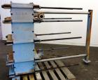 Used Tranter Superchanger Plate Heat Exchanger, Model S-3-HP-76.  250.1 Square feet.  (76) 304 Stainless steel plates. Rated  100 psi at 200 degrees F.  (2) 2-1/2