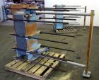 Used Tranter Superchanger Plate Heat Exchanger, Model S-3-HP-76.  250.1 Square feet.  (76) 304 Stainless steel plates.  Rated  100 psi at 200 degrees F.  (2) 2-1/2