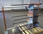 Used Tranter Superchanger Plate Heat Exchanger, Model S-3-HP-76.  250.1 Square feet.  (76) 304 Stainless steel plates.  Rated  100 psi at 200 degrees F.  (2) 2-1/2