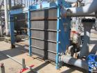 Used- Tranter PHE Plate Heat Exhanger, 3751 sq ft.  Stainless steel plates.  Model UFX-100-5-HP-347, Max: 100 psi @ 150 eg F...