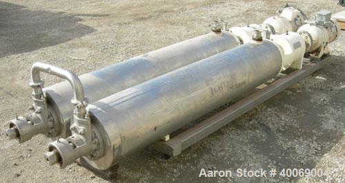 Used: Cherry Burrell Votator scraped surface heat exchanger, model 6SSHE, 9 square feet per exchanger, 18 square feet total, 316 stainless steel heads, 304 stainless steel shell.  (2) 6" diameter x a...