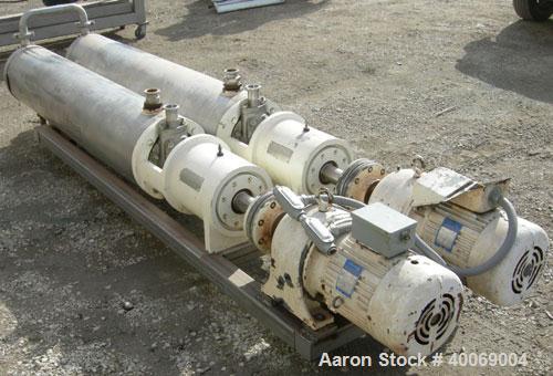 Used: Cherry Burrell Votator scraped surface heat exchanger, model 6SSHE, 9 square feet per exchanger, 18 square feet total, 316 stainless steel heads, 304 stainless steel shell.  (2) 6" diameter x a...