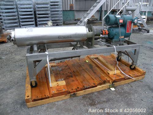 Used Chemetron Votator Scraped Surface Heat Exchanger, 6 square feet, 304 stainless steel. (1) Approximately 6" diameter x 48" long horizontal chamber, plastic type scrapers, jacketed. 1-3/4" inlet a...