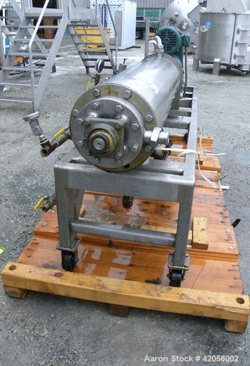 Used Chemetron Votator Scraped Surface Heat Exchanger, 6 square feet, 304 stainless steel. (1) Approximately 6" diameter x 48" long horizontal chamber, plastic type scrapers, jacketed. 1-3/4" inlet a...