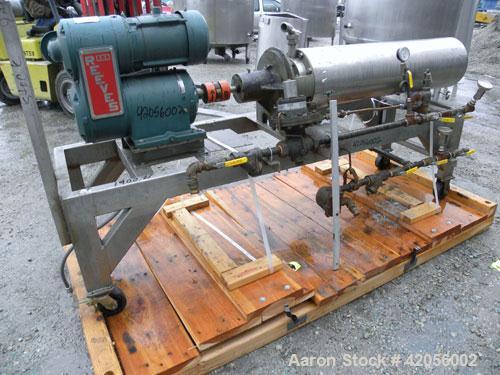 Used Chemetron Votator Scraped Surface Heat Exchanger, 6 square feet, 304 stainless steel. (1) Approximately 6" diameter x 48" long horizontal chamber, plastic type scrapers, jacketed. 1-3/4" inlet a...