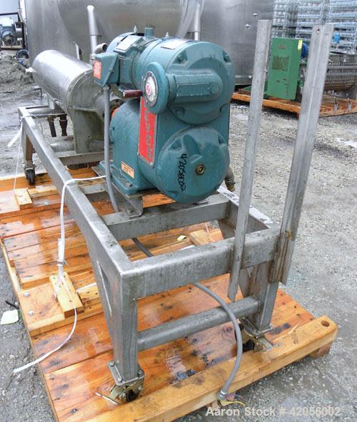 Used Chemetron Votator Scraped Surface Heat Exchanger, 6 square feet, 304 stainless steel. (1) Approximately 6" diameter x 48" long horizontal chamber, plastic type scrapers, jacketed. 1-3/4" inlet a...