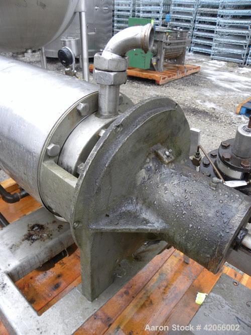 Used Chemetron Votator Scraped Surface Heat Exchanger, 6 square feet, 304 stainless steel. (1) Approximately 6" diameter x 48" long horizontal chamber, plastic type scrapers, jacketed. 1-3/4" inlet a...
