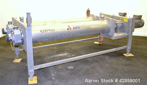Used APV Scraped Surface Heat Exchanger System, Consisting of: (2) APV scraped surface heat exchangers, model T884SSNN. 14.5 Square feet heating surface per tube, 29 total. 8'' Diameter x 84'' long j...