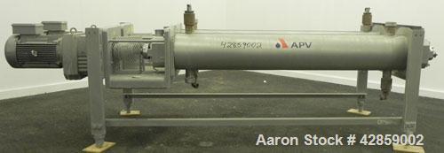 Used APV Scraped Surface Heat Exchanger System, Consisting of: (2) APV scraped surface heat exchangers, model T884SSNN. 14.5 Square feet heating surface per tube, 29 total. 8'' Diameter x 84'' long j...