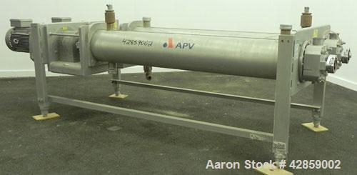 Used APV Scraped Surface Heat Exchanger System, Consisting of: (2) APV scraped surface heat exchangers, model T884SSNN. 14.5 Square feet heating surface per tube, 29 total. 8'' Diameter x 84'' long j...