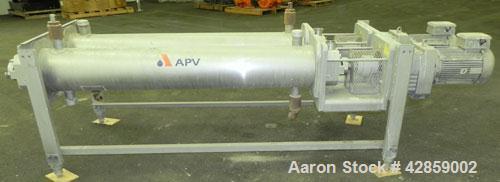 Used APV Scraped Surface Heat Exchanger System, Consisting of: (2) APV scraped surface heat exchangers, model T884SSNN. 14.5 Square feet heating surface per tube, 29 total. 8'' Diameter x 84'' long j...