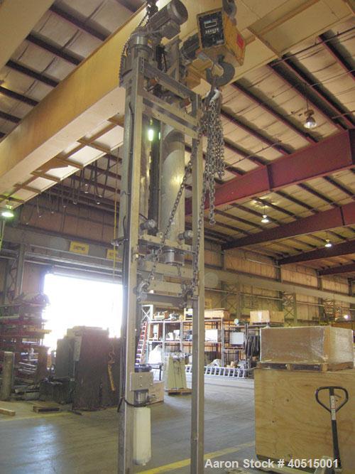 Used APV Vertical Scraped Surface Heat Exchanger System, 316 stainless steel. Consisting of: (2) APV scraped surface heat exchangers, model V884WWNN, 14.5 square feet heating surface per tube, 29 tot...