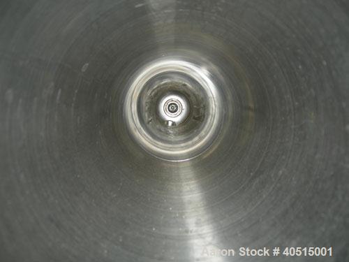 Used APV Vertical Scraped Surface Heat Exchanger System, 316 stainless steel. Consisting of: (2) APV scraped surface heat exchangers, model V884WWNN, 14.5 square feet heating surface per tube, 29 tot...