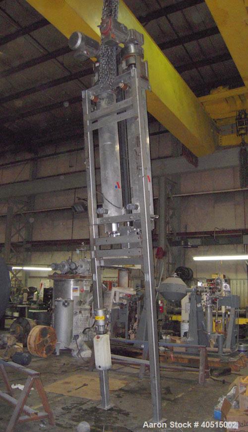 Used APV Vertical Scraped Surface Heat Exchanger System, 316 stainless steel. Consisting of: (2) APV scraped surface heat exchangers, model V884WWNN, 14.5 square feet heating surface per tube, 29 tot...