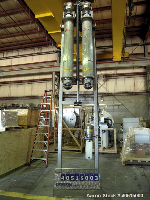 Used APV Vertical Scraped Surface Heat Exchanger System, 316 stainless steel. Consisting of: (2) APV scraped surface heat exchangers, model V884WWNN, 14.5 square feet heating surface per tube, 29 tot...