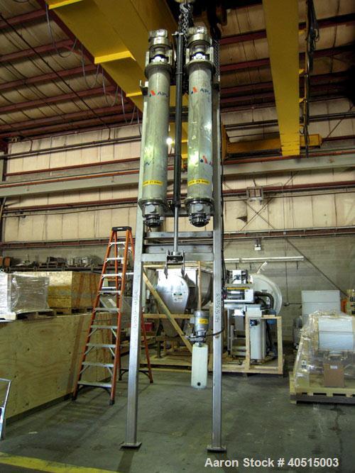 Used APV Vertical Scraped Surface Heat Exchanger System, 316 stainless steel. Consisting of: (2) APV scraped surface heat exchangers, model V884WWNN, 14.5 square feet heating surface per tube, 29 tot...