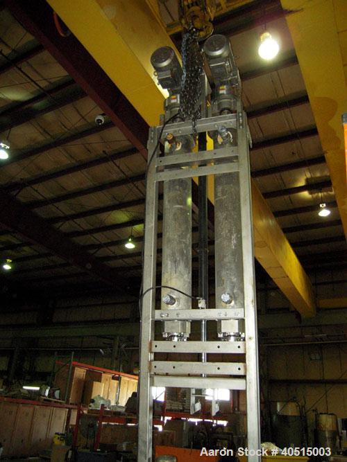Used APV Vertical Scraped Surface Heat Exchanger System, 316 stainless steel. Consisting of: (2) APV scraped surface heat exchangers, model V884WWNN, 14.5 square feet heating surface per tube, 29 tot...