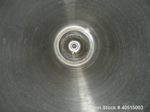 Used APV Vertical Scraped Surface Heat Exchanger System, 316 stainless steel. Consisting of: (2) APV scraped surface heat exchangers, model V884WWNN, 14.5 square feet heating surface per tube, 29 tot...