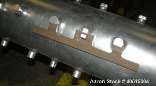 Used APV Vertical Scraped Surface Heat Exchanger System, 316 stainless steel. Consisting of: (2) APV scraped surface heat exchangers, model V884WWNN, 14.5 square feet heating surface per tube, 29 tot...