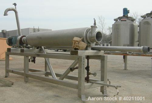 Used Alfa Laval Scraped Surface Heat Exchanger, Approximately 9 Square Feet, Model 6 X 9, 316 Stainless Steel. 6'' diameter x 72'' long horizontal chamber, internal rated 300 psi at 300 deg F, jacket...