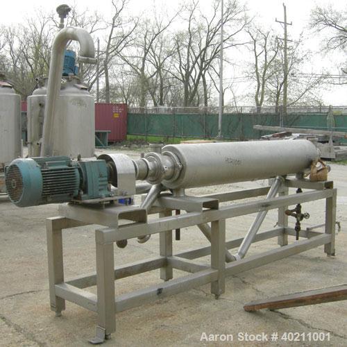 Used Alfa Laval Scraped Surface Heat Exchanger, Approximately 9 Square Feet, Model 6 X 9, 316 Stainless Steel. 6'' diameter x 72'' long horizontal chamber, internal rated 300 psi at 300 deg F, jacket...