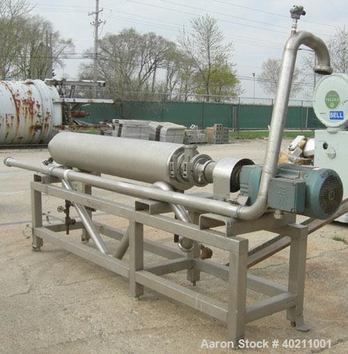 Used Alfa Laval Scraped Surface Heat Exchanger, Approximately 9 Square Feet, Model 6 X 9, 316 Stainless Steel. 6'' diameter x 72'' long horizontal chamber, internal rated 300 psi at 300 deg F, jacket...