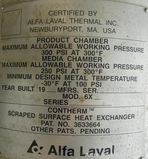 Used Alfa Laval Scraped Surface Heat Exchanger, Approximately 9 Square Feet, Model 6 X 9, 316 Stainless Steel. 6'' diameter x 72'' long horizontal chamber, internal rated 300 psi at 300 deg F, jacket...