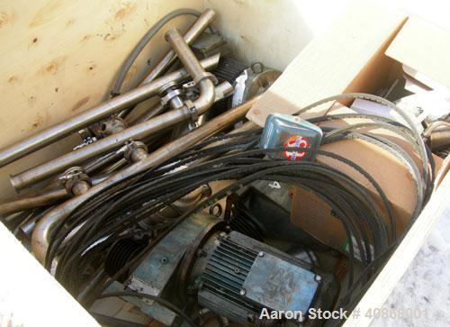 Used Alfa Laval Contherm Vertical Scraped Surface Heat Exchanger System, 27 total square feet, 316 stainless steel. Consisting of: (3) Alfa Laval scraped surface heat exchangers, model 6X9. 9 square ...