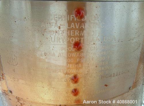 Used Alfa Laval Contherm Vertical Scraped Surface Heat Exchanger System, 27 total square feet, 316 stainless steel. Consisting of: (3) Alfa Laval scraped surface heat exchangers, model 6X9. 9 square ...