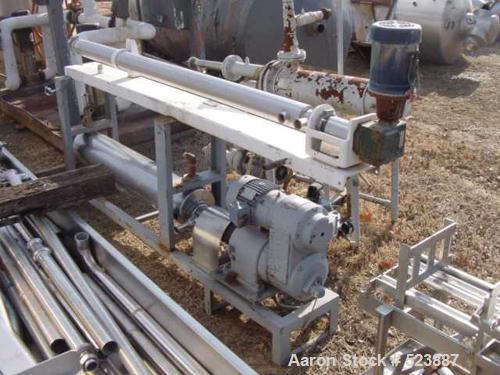 USED: Chemetron Process Equipment Votator scraped surface heat exchanger. Top cylinder is 6" diameter x 10' long; the bottom cylinder is 13" x 72" long, model L-SAN-L00.