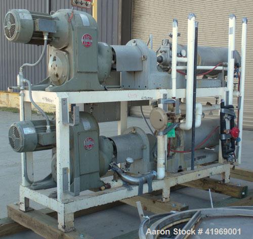Used Chemetron Votator Scraped Surface Heat Exchanger, 12 total square feet, 304 stainless steel. (2) Approximately 6'' diameter x 48'' long horizontal chambers, plastic type scrapers, carbon steel j...
