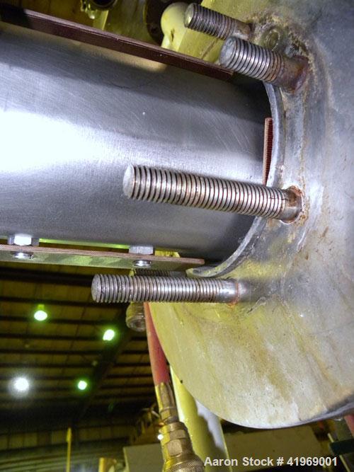 Used Chemetron Votator Scraped Surface Heat Exchanger, 12 total square feet, 304 stainless steel. (2) Approximately 6'' diameter x 48'' long horizontal chambers, plastic type scrapers, carbon steel j...