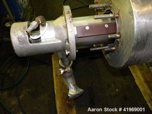 Used Chemetron Votator Scraped Surface Heat Exchanger, 12 total square feet, 304 stainless steel. (2) Approximately 6'' diameter x 48'' long horizontal chambers, plastic type scrapers, carbon steel j...