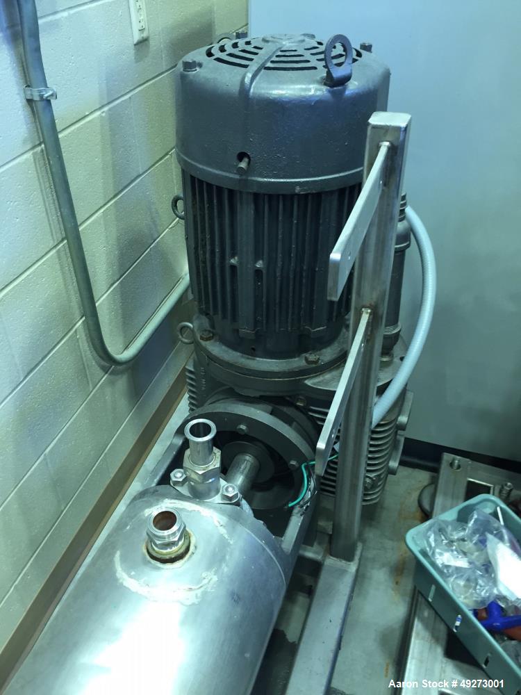 Used- Chemetron Scraped Surface Heat Exchanger. Approximately 9 square feet, stainless steel. 6'' diameter x 72'' long horiz...