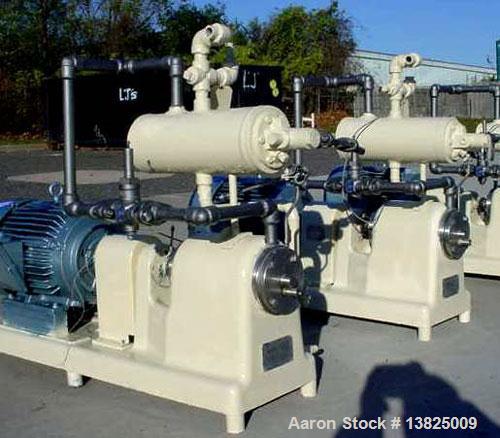Used Votator margarine pilot plant scraped wall heat exchanger, stand alone, manufactured by Cherry Burrell, model 1C312-A heat exchanger. Size 3 x 12. Has 3 sets of metal blades, cylinder looks good...