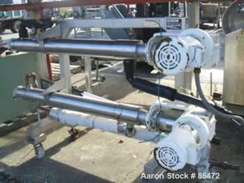 USED: Cherry Burrell dual chamber votator scraped surface heat exchanger, 9 square feet, model 4SSHE, 316 stainless steel. (2) 4" diameter x 60" long jacketed horizontal chambers rated internal 200 p...